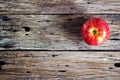 Red apple on old old wooden table Royalty Free Stock Photo