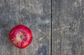 red apple on an old, worn garden table Royalty Free Stock Photo