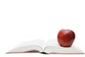 Red apple on the open book Royalty Free Stock Photo