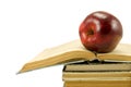 Red apple on open book Royalty Free Stock Photo