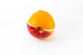 red apple and orange half isolated. Royalty Free Stock Photo