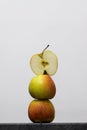 Red apple pile pyramid. Fresh fruit apples isolated on white background Royalty Free Stock Photo