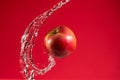 Red Apple on Red Background