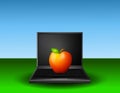 Red Apple Sitting on Laptop Royalty Free Stock Photo