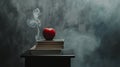 A red apple sitting on top of a stack of books on top of a black table Royalty Free Stock Photo