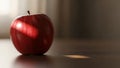 A stripe of illumination across the apple casting a gentle shadow Royalty Free Stock Photo
