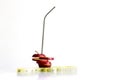 Red apple stack with with straw and measuring tape Royalty Free Stock Photo