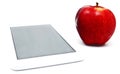 Red apple and tablet PC isolated