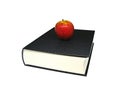 Red apple on top of black hard-cover dictionary book isolated on white background. Royalty Free Stock Photo