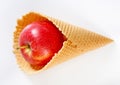 Red apple in waffle cornet Royalty Free Stock Photo