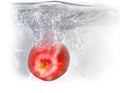 Red apple in water.