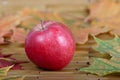 Red apple which has been removed on napkin