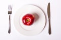 Red apple on white plate Royalty Free Stock Photo