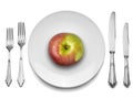 Red apple on white plate with knife and fork, Royalty Free Stock Photo
