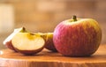 Red apple on the wood object. Royalty Free Stock Photo