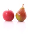 Red apple and yellow-green pear isolated Royalty Free Stock Photo