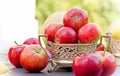 Red apples in antique bowl