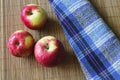 Red apples autumn harvest on straw napkin Royalty Free Stock Photo