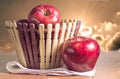 Red apples and basket with sky