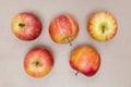 Red apples on brown craft paper. Flat lay. Top view. Royalty Free Stock Photo