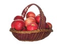 Red apples in a decorative fruit basket isolated on white background.