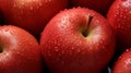 Red apples with droplets of wate close-up on a black background. Diet healthy food. Ai generated