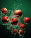 Red apples fall into the water Royalty Free Stock Photo