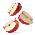 Red Apples Sliced and Falling isolated on white background Royalty Free Stock Photo