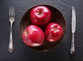 Red apples and table settings.