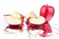 Red apples whole apple and cutted on white background isolated close up macro Royalty Free Stock Photo