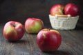 Red apples in a wooden bucket. On a rustic background. Royalty Free Stock Photo