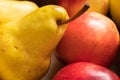 Red apples and yellow pears close up. Royalty Free Stock Photo