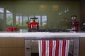 Red appliances on a kitchen bench