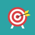 Red archery target with arrow icon isolated on blue background. Dartboard vector illustration