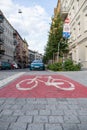 Red area reserved for bicycles in the Lazarz district Royalty Free Stock Photo