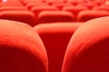 red armchairs. Empty concert hall, theater chairs background ... color photo, empty cinema or concert hall. The red