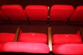 red armchairs. Empty concert hall, theater chairs background ... color photo, empty cinema or concert hall. The red