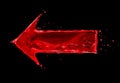 Red arrow made of water on black background