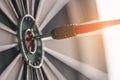 The red arrow in the middle of the dart board shown success. The concept of setting business goals Possible business planning. Royalty Free Stock Photo