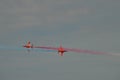 Red arrows crossing