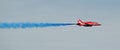 Red arrows in coloured smoke