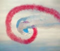 Red arrows contrail swirl Royalty Free Stock Photo