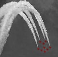 Red arrows and contrails Royalty Free Stock Photo