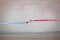 Red arrows flyby crossover Royalty Free Stock Photo