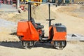 Red asphalt paver Royalty Free Stock Photo