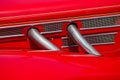 Red automobile exhaust system componen-corrugated