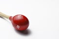 Red baby whistle isolated on white background.Copy space