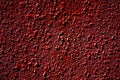 Red background and abstract background, uneven surface, coating abstract. Wall grunge texture with red tones. Vintage red abstract Royalty Free Stock Photo