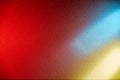 On a red background, blue and yellow rays of light Royalty Free Stock Photo