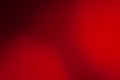 Red background. Blurred soft red background. Blurred colored abstract